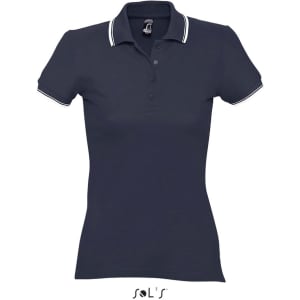A navy blue women's polo shirt made of 100% combed ring spun cotton, featuring contrasting collar stripes and buttons.