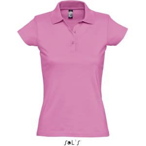 A pink women's polo shirt made of 100% semi-combed ring spun cotton, featuring a collar and buttons.