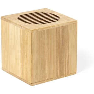 A bamboo speaker with a square shape and slotted top, featuring a natural wood finish.