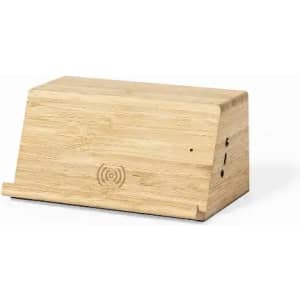 A bamboo charging station with a sleek, rectangular design and a wireless charging feature.