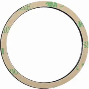 A circular adhesive tape with a beige backing and a black centre. It features a branding logo.