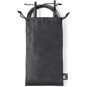 A black drawstring bag containing jump rope handles and cables, featuring a small logo tag.