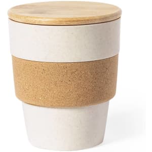 A stackable drink container in white and beige with a wooden lid and a cork band around the middle.
