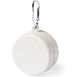 A round, off-white product with a carabiner clip, featuring a smooth surface and a subtle speckled texture.