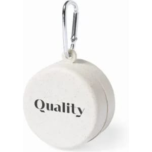 A round white item with a carabiner, featuring the word "Quality" on its surface and a logo.