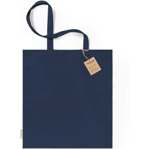 A navy blue tote bag with long straps and a hang tag attached. It features a simple, minimalist design.