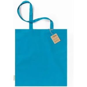 A turquoise tote bag with two handles and a tag attached, made from durable fabric.