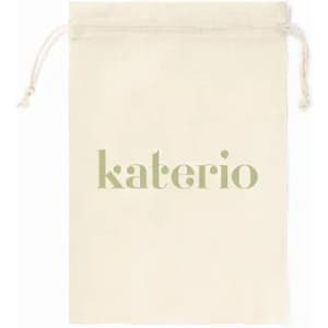 A drawstring bag in a natural cream colour with a green logo on the front.