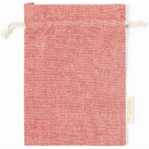 A drawstring pouch in a textured, light red fabric with natural cotton ties. It features a small branding label.