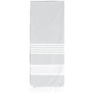 A light grey towel with white stripes and fringed edges, featuring a simple and elegant design.