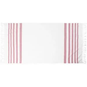 A beach towel featuring a white background with pink stripes and a logo on one side.