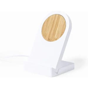 A charging dock featuring a white base and a round bamboo charging pad on top.