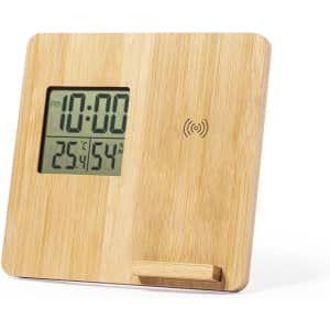 A digital clock made from bamboo, featuring a large display for time and temperature, with a minimalist design.