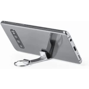 A phone with a silver stand and keyring attached, propped up for display. The device is sleek and metallic in appearance.