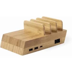 A wooden charging station with multiple slots and various ports, showcasing a natural finish.