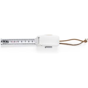 A tape measure in white and silver, featuring a leather strap for ease of handling.