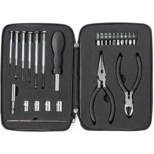 A tool kit containing various screwdrivers, pliers, and socket pieces, all neatly arranged in a zipped black case.