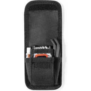 A tool pouch in black fabric containing various tools and accessories, secured in multiple compartments.