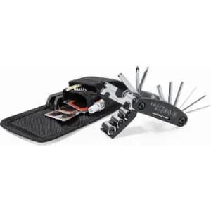 A multi-tool with various attachments laid out beside a sleek black carrying case.