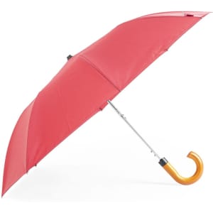 A red umbrella with a curved orange handle, featuring a metallic frame. It has a simple, sleek design.