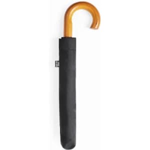 A black umbrella with a wooden handle, resting in its black sleeve. The handle features a curved design.