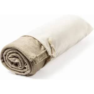 A rolled-up, beige blanket with a tie closure, featuring a soft texture and a simple design.