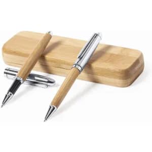 A pen set featuring two wooden pens with chrome accents, displayed on a natural wood holder.