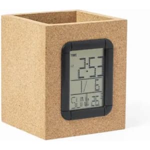 A square cork clock with a digital display showing time and date. The edges are lined with black material.
