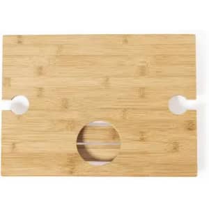 A bamboo cutting board with a smooth surface and rounded cutouts on each side. It has a circular hole in the centre.