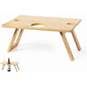A wooden serving tray table with two circular cut-outs, featuring a light bamboo finish and angled wooden legs.