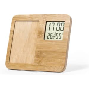 A bamboo digital clock with a display for time and temperature, featuring a wooden panel on one side.