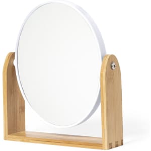 A circular mirror with a wooden stand in a natural bamboo finish, featuring a simple and modern design.