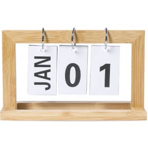 A desk calendar featuring a wooden frame, displaying January and the date as 01 in black on white cards.