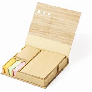 A bamboo sticky note organiser with various coloured sticky notes and a notepad inside. It features a branded logo.