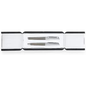 A gift set featuring two silver pens presented in a sleek black and silver box.