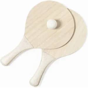 A wooden bat and ball set in light wood tones, featuring two paddles and a central ball.