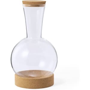 A drink bottle with a clear glass body and a cork base and lid.