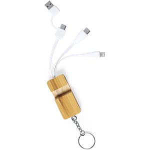 A keychain multi-charger with a bamboo body and three cables: USB, micro-USB, and Lightning connector.
