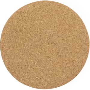 A round cork coaster in a natural brown shade, featuring a smooth, textured surface.