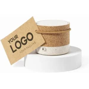 A drink bottle with a cork and white body, featuring a leather strap and a blank tag for branding.