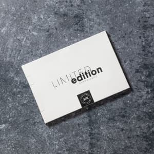 A rectangular white box with the words "LIMITED edition EXPERIENCE" in black text, featuring a logo on the bottom.