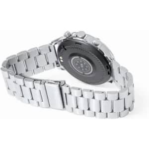 A silver watch with a metal band featuring a textured back and multiple buttons. It has a logo on the back.