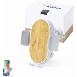 A phone holder with a bamboo-like panel and white clips, placed next to a box with a logo.