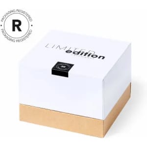 A white box with a gold base, featuring a minimalist design and a logo on top. Includes a label stating "Limited Edition."