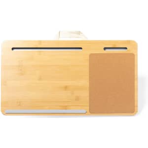 A bamboo lap desk featuring a cork section and metal holder, perfect for writing or using a laptop.