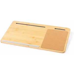 A bamboo desk mat with a cork section and silver accents, featuring groove slots for organisation.