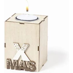 A wooden tea light holder in a cube shape, featuring the letters "XMAS" and a lit candle on top.