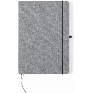 A notebook with a grey fabric cover, featuring an elastic band and a ribbon bookmark. It has a logo on the front.