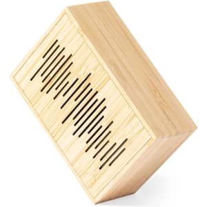 A wooden box with a slatted design, featuring a natural bamboo finish and a sleek, angled shape.