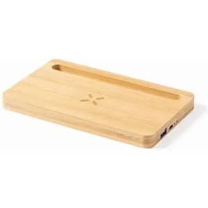 A wooden charging pad in a sleek rectangular shape, featuring a groove and a branding logo.